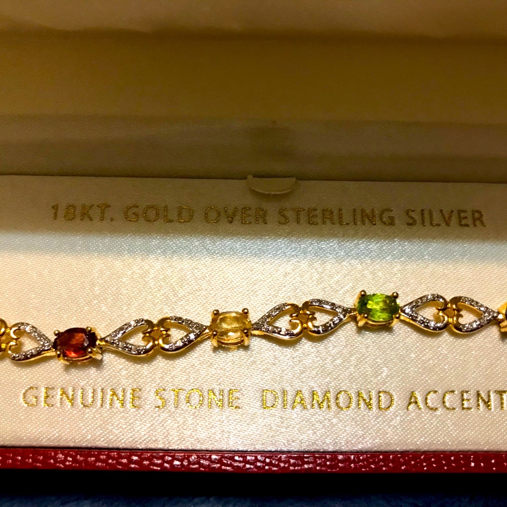 Gorgeous 18kt Gold over Sterling Silver with Genuine Stones and Diamond accents.